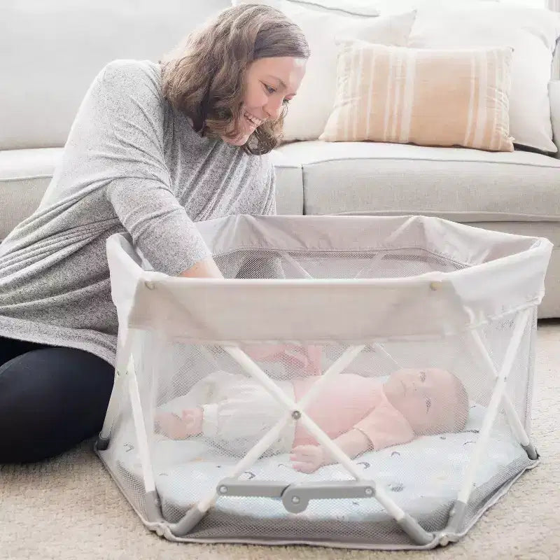 Portable Infant Activity Center: Metal Frame, 15 lb Capacity, Folds for Transport & Storage